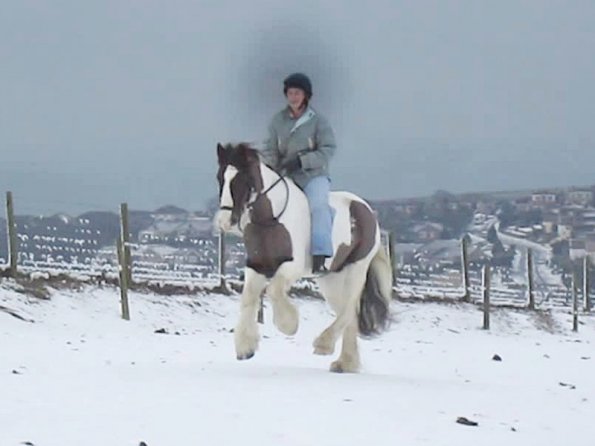Anna and Lance cantering