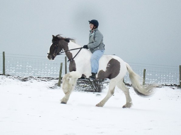 Lance and Anna riding in the snow